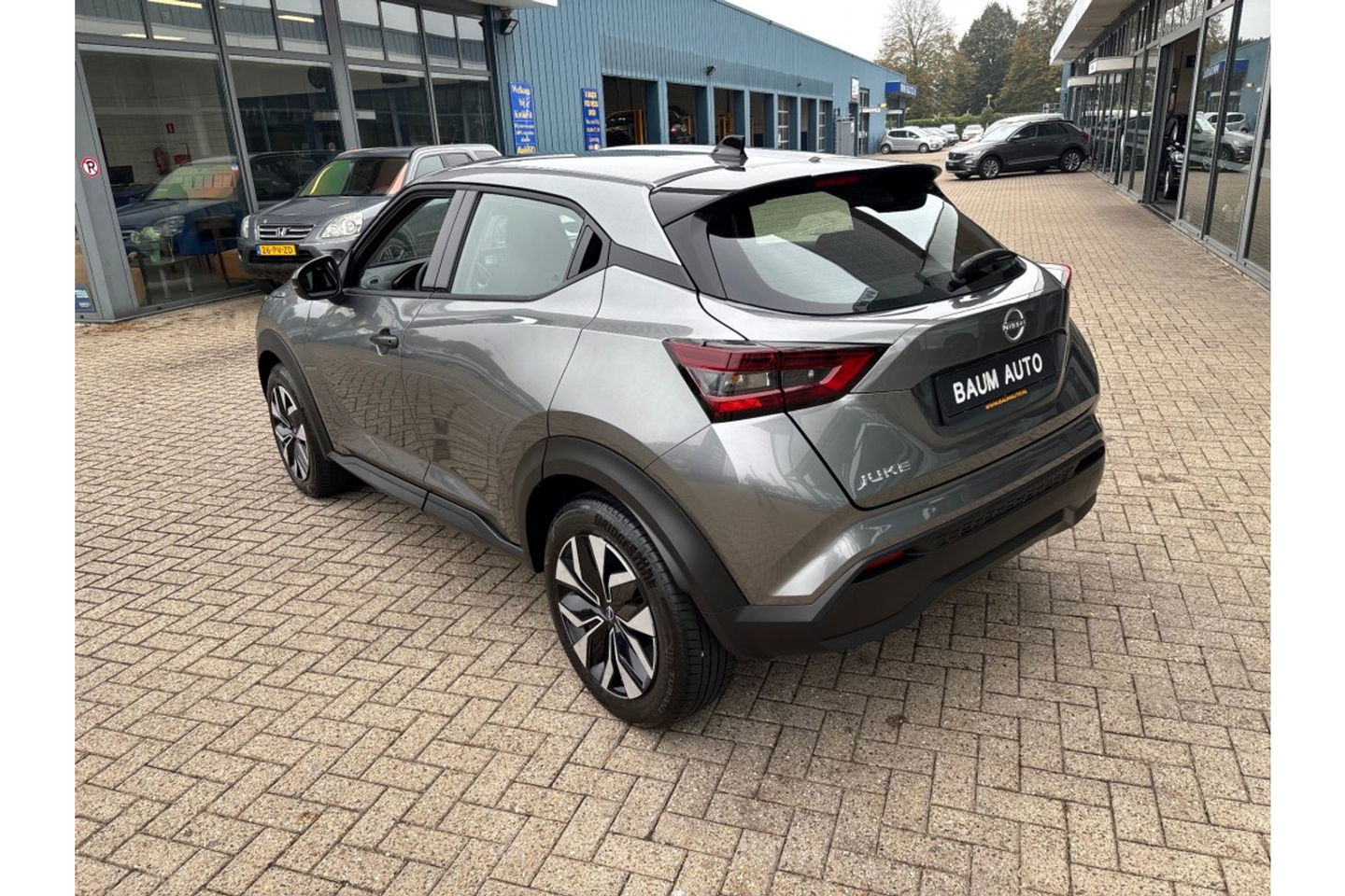 Nissan Juke 1.0 DIG-T ACENTA AUTOMAAT AIRCO NAVI PDC-CAMERA.