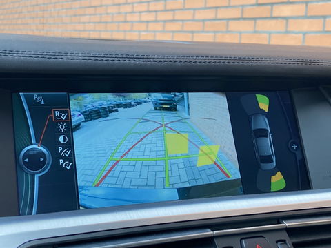 BMW 7 Serie 740d High Executive M-pakket | Head-Up Display | Softclose | Adaptieve cruise control | 19" Lichtmetaal  | Camera | Leder | Navigatie | Elektrisch Stuurwiel | Stuurwielverwarming