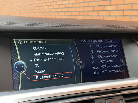 BMW 7 Serie 740d High Executive M-pakket | Head-Up Display | Softclose | Adaptieve cruise control | 19" Lichtmetaal  | Camera | Leder | Navigatie | Elektrisch Stuurwiel | Stuurwielverwarming