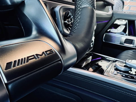 Mercedes-Benz G-Klasse 63 Premium Plus | AMG | V8 | Burmester | 22" Lichtmetaal | Lederen bekleding | Massage | Widescreen | Alcantara hemelbekleding | Schuif/kantel dak |