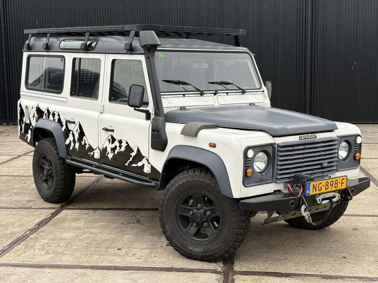 Land Rover Defender 2.5 TD5 110 SAFARI | OMKEUREN 2PERS GRIJS KENTEKEN MOGELIJK | LIER | LUXE STOEL | SNORKEL | DAKTENT FEMKES | RVS UITLAAT | Youngtimer