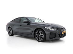 BMW i4 eDrive40 84 kWh M-Sportpack [ 3-Fase ] { SOH-95%} (INCL-BTW) *LEATHER-ALCANTARA | FULL-LED | ADAPTIVE-CRUISE | WIDE-SCREEN-DIGI-COCKPIT | DAB+ | CAMERA | AMBIENT-LIGHT | CARPLAY | SPORT-SEATS | PRIVACY-GLASS | TOWBAR | 18''ALU*