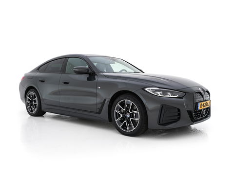 BMW i4 eDrive40 84 kWh M-Sportpack [ 3-Fase ] { SOH-95%} (INCL-BTW) *LEATHER-ALCANTARA | FULL-LED | ADAPTIVE-CRUISE | WIDE-SCREEN-DIGI-COCKPIT | DAB+ | CAMERA | AMBIENT-LIGHT | CARPLAY | SPORT-SEATS | PRIVACY-GLASS | TOWBAR | 18''ALU*