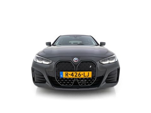 BMW i4 eDrive40 84 kWh M-Sportpack [ 3-Fase ] { SOH-95%} (INCL-BTW) *LEATHER-ALCANTARA | FULL-LED | ADAPTIVE-CRUISE | WIDE-SCREEN-DIGI-COCKPIT | DAB+ | CAMERA | AMBIENT-LIGHT | CARPLAY | SPORT-SEATS | PRIVACY-GLASS | TOWBAR | 18''ALU*