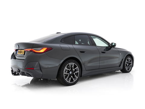 BMW i4 eDrive40 84 kWh M-Sportpack [ 3-Fase ] { SOH-95%} (INCL-BTW) *LEATHER-ALCANTARA | FULL-LED | ADAPTIVE-CRUISE | WIDE-SCREEN-DIGI-COCKPIT | DAB+ | CAMERA | AMBIENT-LIGHT | CARPLAY | SPORT-SEATS | PRIVACY-GLASS | TOWBAR | 18''ALU*