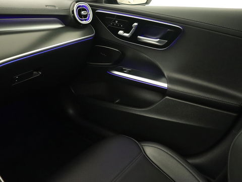 Mercedes-Benz C-Klasse 300e AMG Night | Panoramadak | Trekhaak | Sfeerverlichting | Massage | Adaptive cruise | Stoelverwarming | 360 Camera | Leder | Memory | Carplay | PHEV | Plug In