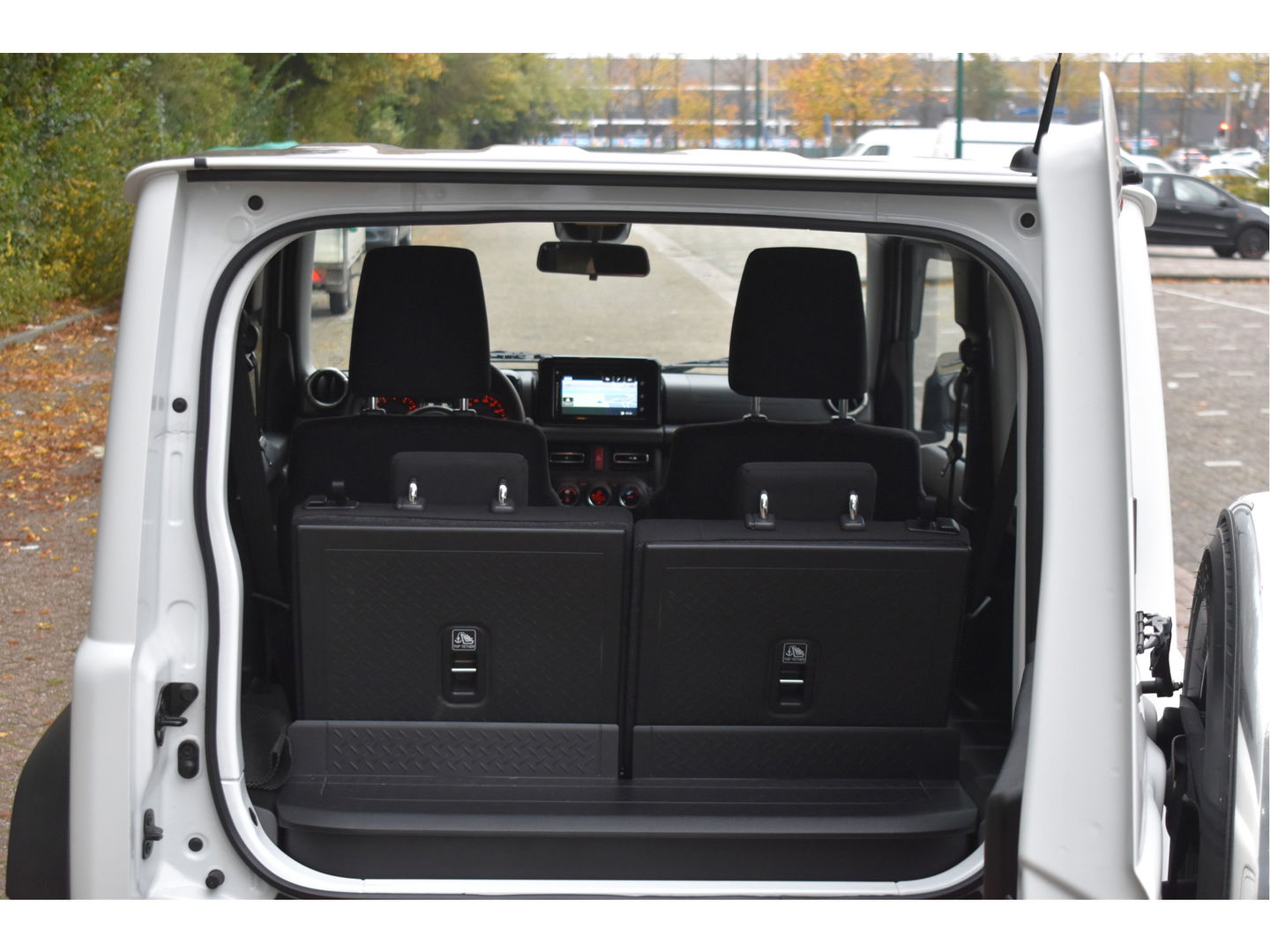 Suzuki Jimny 1.5 Stijl Allgrip 4WD Two-tone | Uniek | NL-Auto | Afn.trekhaak | Carplay/Anroid | Nav | DAB | Stoelverwarming | Climate Control | Nieuwstaat