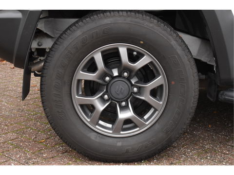 Suzuki Jimny 1.5 Stijl Allgrip 4WD Two-tone | Uniek | NL-Auto | Afn.trekhaak | Carplay/Anroid | Nav | DAB | Stoelverwarming | Climate Control | Nieuwstaat