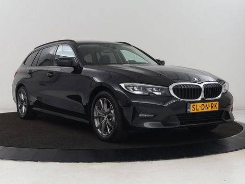 BMW 3 Serie Touring 330e | Trekhaak | Half Leder | Stoel & Stuurverwarming | Sfeerverlichting | Carplay | Cruise Control | PDC