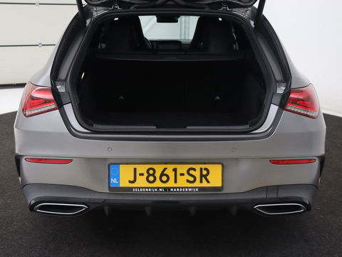 Mercedes-Benz CLA-Klasse 180d Business Solution AMG | Stoelverwarming | Carplay | Camera | Leder/Alcantara | Navigatie | Widescreen | Sfeerverlichting | Designo Mountaingrijs Magno