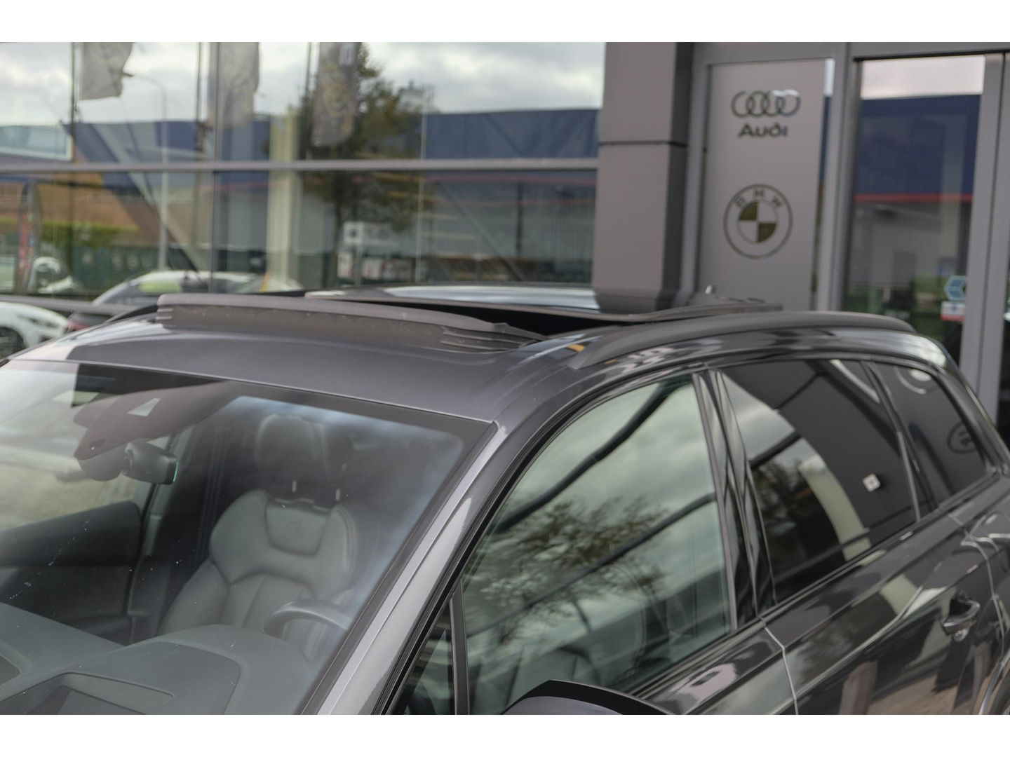 Audi Q7 60 TFSIe 455pk Competition Hybrid Panoramadak *BTW* Head-up Trekhaak elektrisch Leder Adaptive cruise DAB Carplay