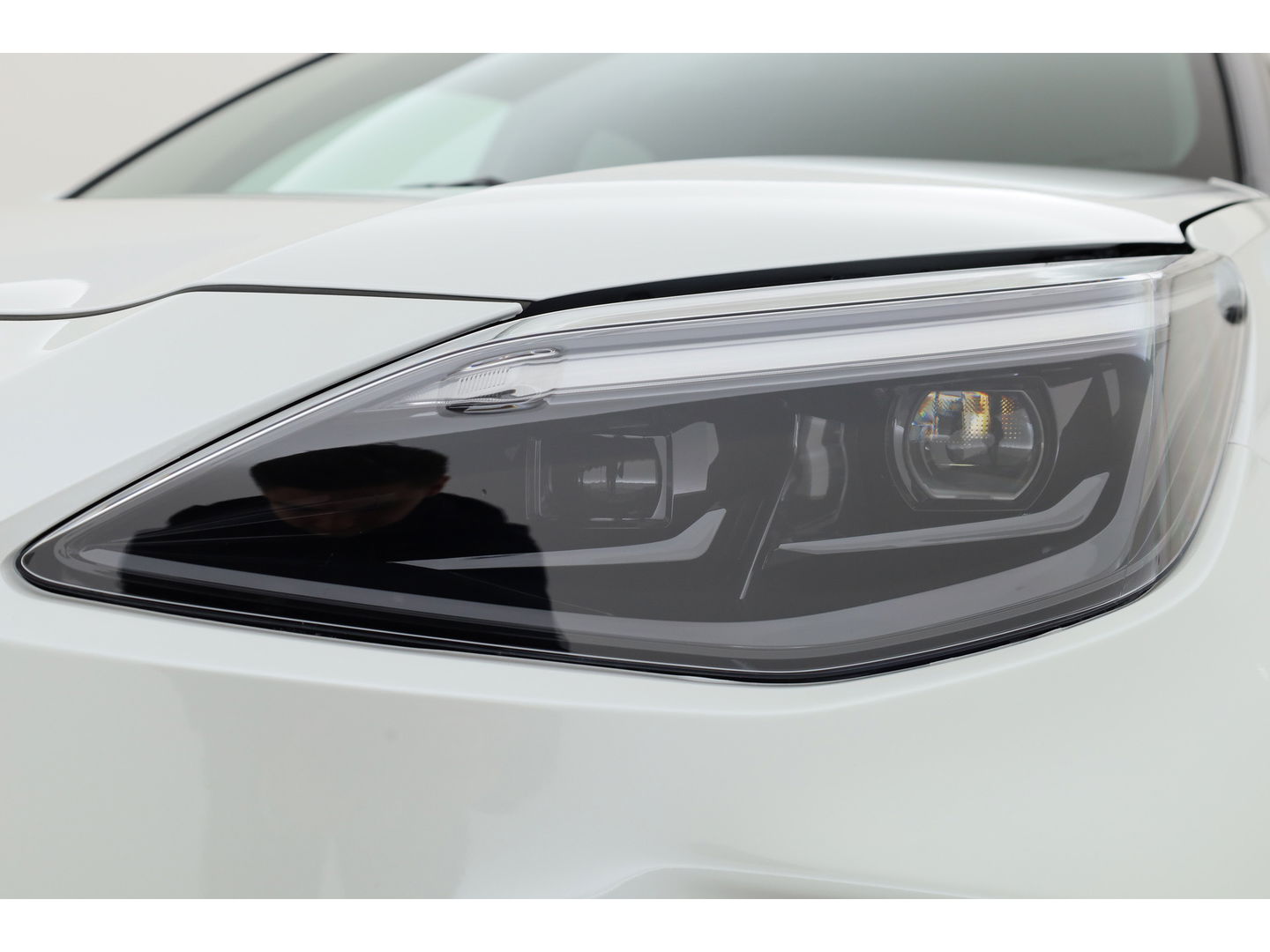 Toyota Yaris Cross 1.5 Hybrid 130 Teamplayer | Pearl White parelmoer | Winter pack | Safety Pack | Adapt. Cruise | Camera