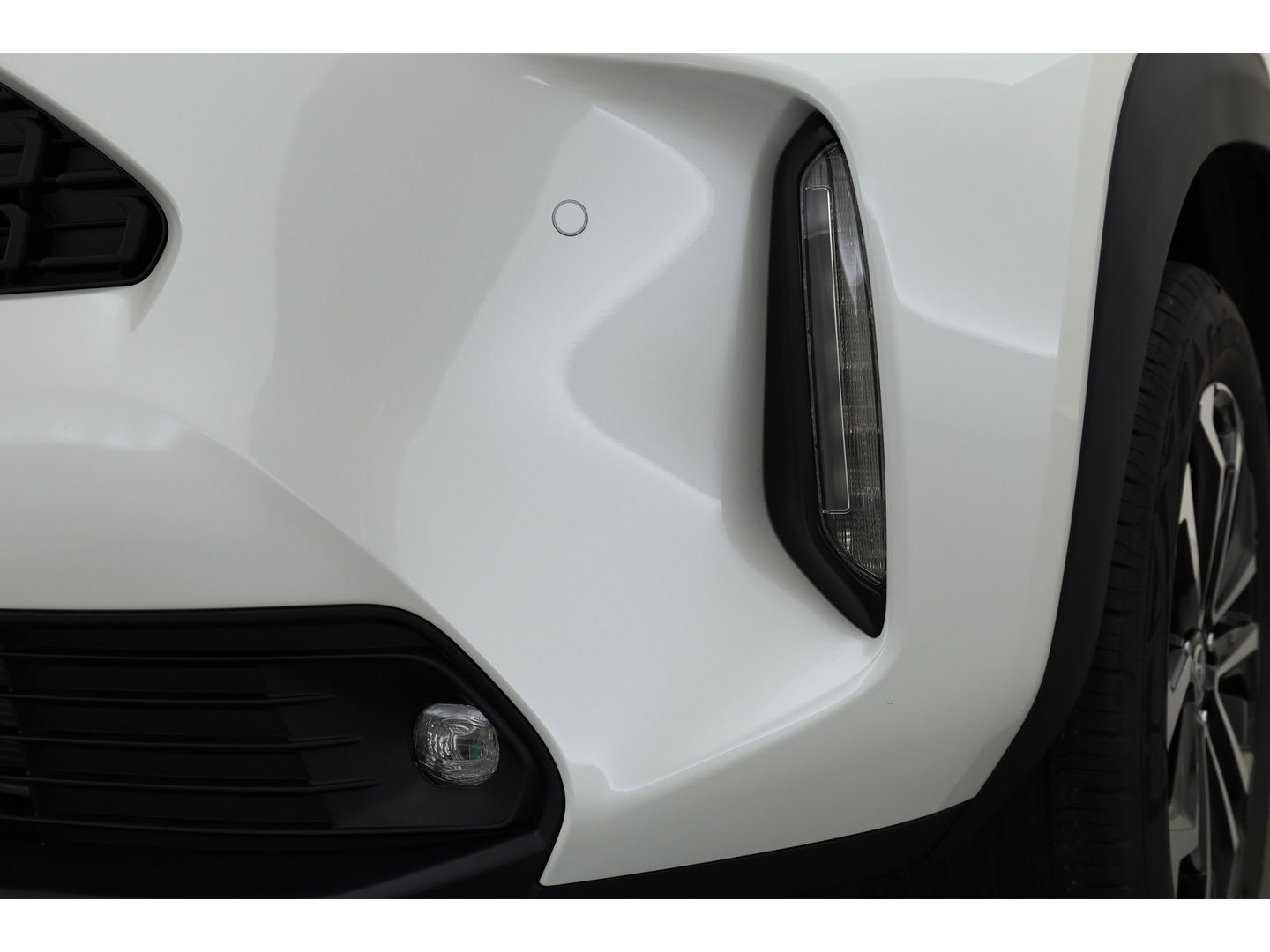 Toyota Yaris Cross 1.5 Hybrid 130 Teamplayer | Pearl White parelmoer | Winter pack | Safety Pack | Adapt. Cruise | Camera