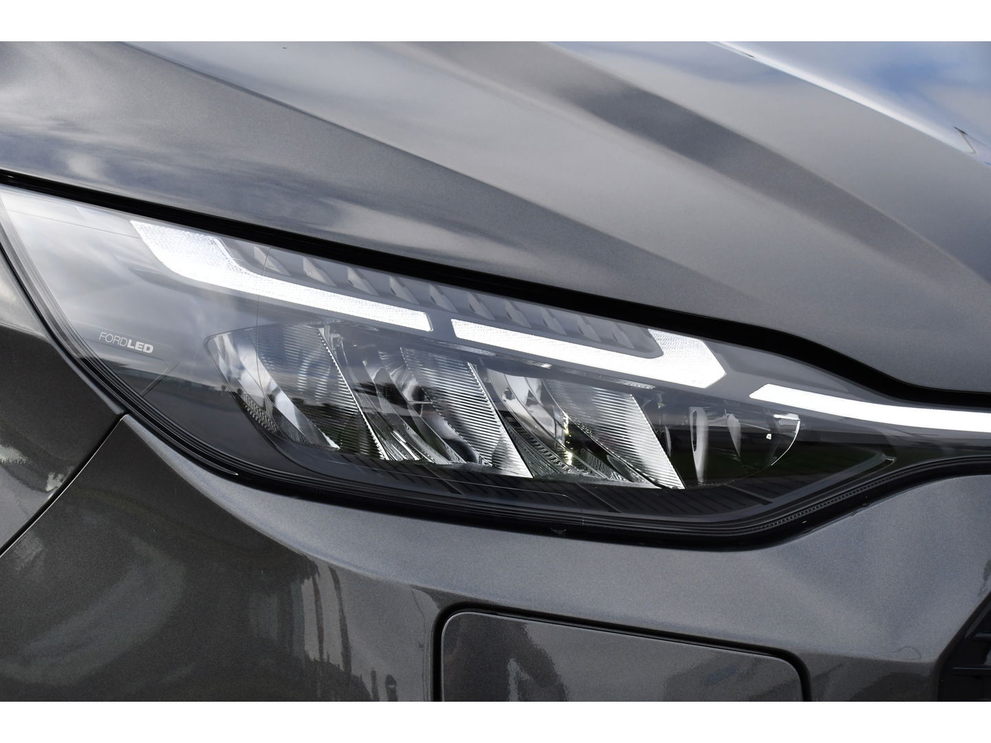 Ford E-Transit Cust. 340 L2H1 Limited 65 kWh DEMO, Virtual, Adaptieve Cruise, Camera, Carplay, Stoelverwarming, LED, 218pk, NAVI, Uniek!