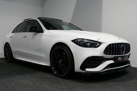 Mercedes-Benz C-Klasse 300 e AMG Line / C63S AMG Diffuser / Panamericana Grill / Panoramadak / Massage stoelen / Stoelverwarm- & koeling / Ambienteverlichting Premium / Elektr. verstelbare voorstoelen + memory / Apple Carplay - Android Auto / Head-up Display / Stuurwiel verwarm