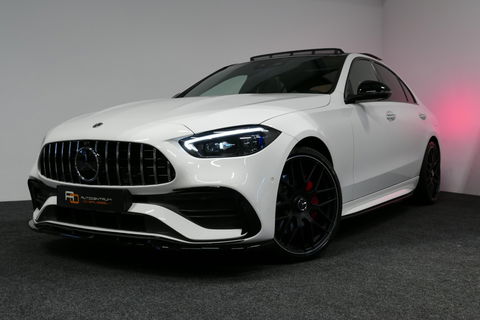 Mercedes-Benz C-Klasse 300 e AMG Line / C63S AMG Diffuser / Panamericana Grill / Panoramadak / Massage stoelen / Stoelverwarm- & koeling / Ambienteverlichting Premium / Elektr. verstelbare voorstoelen + memory / Apple Carplay - Android Auto / Head-up Display / Stuurwiel verwarm