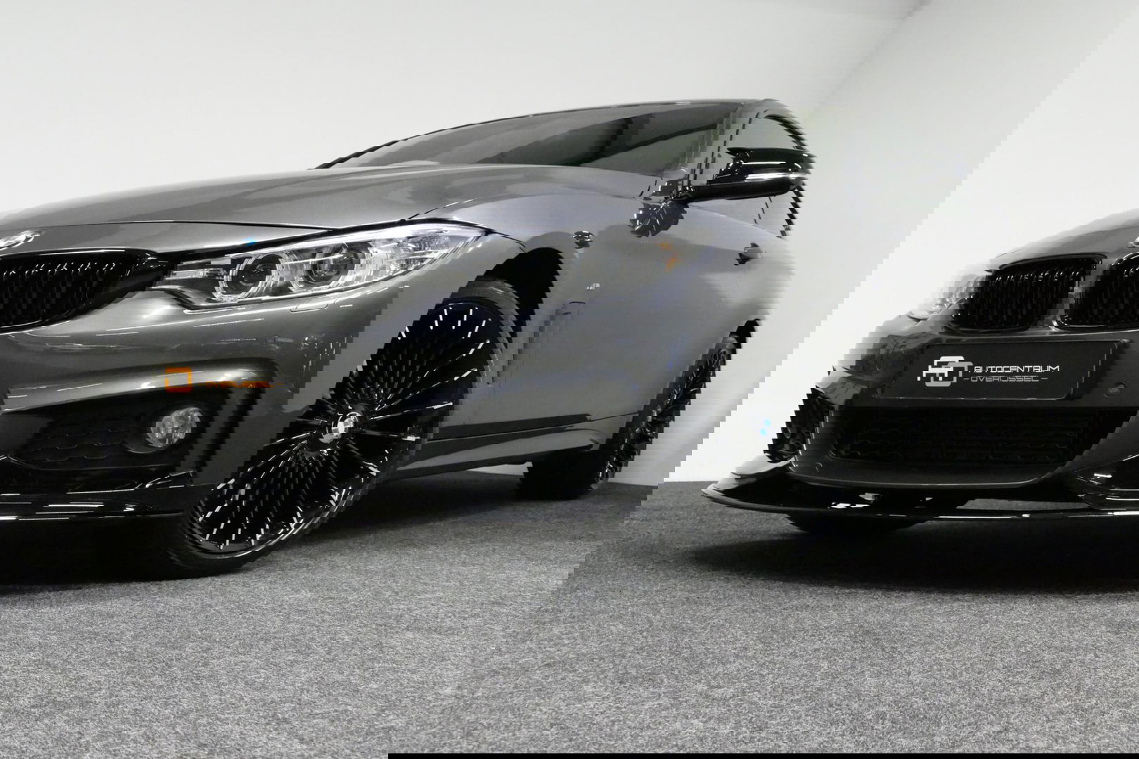 BMW 4 Serie Coupé 428i xDrive M Sport / Stoelverwarming / M Sport-chassis - adaptief onderstel / Navigatie / Climatronic / 19'' LMV / PDC / HiFi speakersysteem / Lederen bekleding / Bi-xenon koplampen / Grootlichtassistent / Sportbesturing variabel