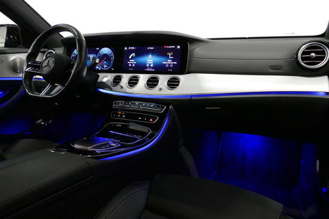 Mercedes-Benz E-Klasse Estate 300 e AMG Line / E63 AMG Grill / E63 AMG Diffuser / Panoramadak / Burmester Sound System / Sfeerverlichting / Luchtvering (achteras) / LED High Performance / 20'' LMV / Night pakket / Apple Carplay - Andriod auto / Stoelverwarming / Trekhaak (zwenk