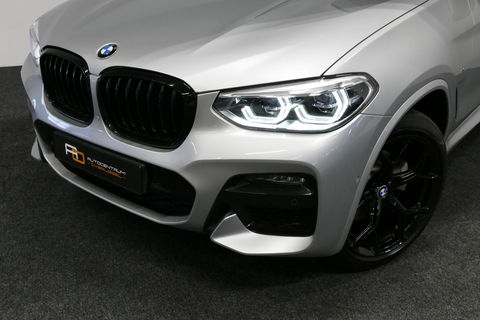 BMW X3 xDrive20i M Sport / Panoramadak / Elektr. verstelbare stoelen (best. memory) / Stoelverwarming / Ambienteverlichting / Apple Carplay - Andriod Auto / Lederen bekleding / M Aerodynamicapakket / Achterbank verwarming / Achteruitrijcamera / Cruise Control / 