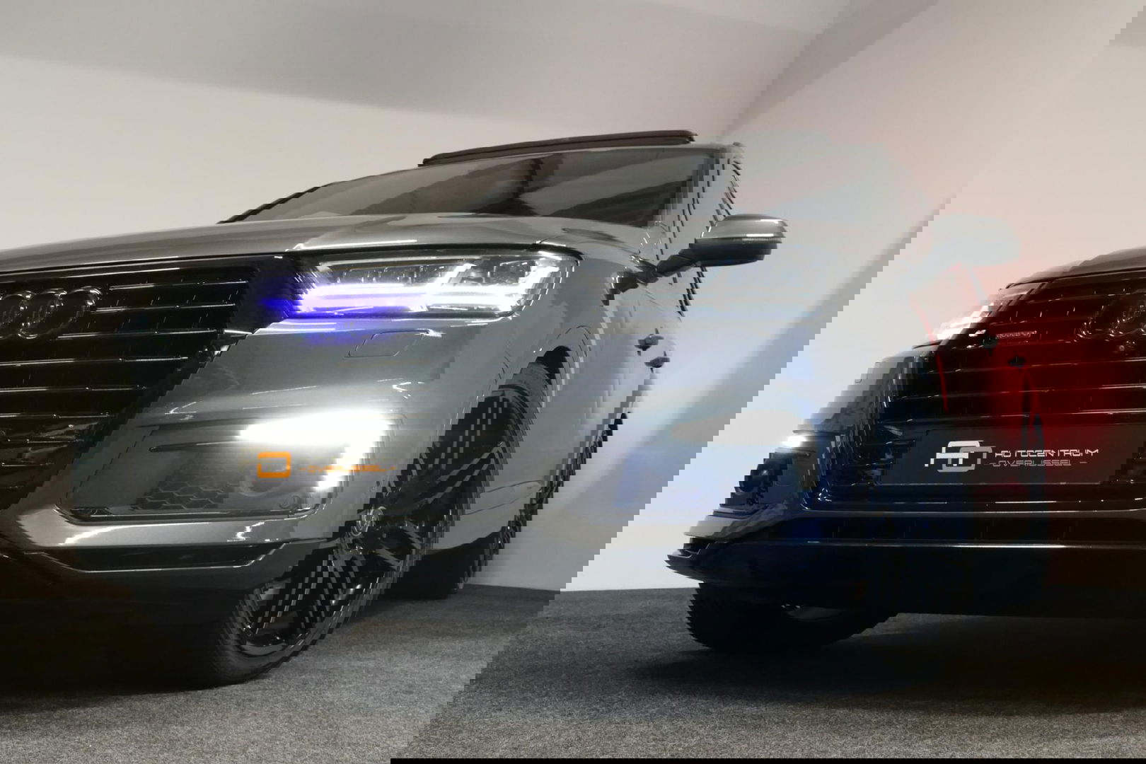 Audi Q7 3.0 TDI e-tron quattro Sport / Orig. Nederlands / S-Line ex- & interieur / Panoramadak / Luchtvering / Elektr. verstelbare voorstoelen (links met memory) / Bose Sound System / Rondomzichtcamera / Sfeerverlichting / Servosluiting - Softclose / Stoelverwarm