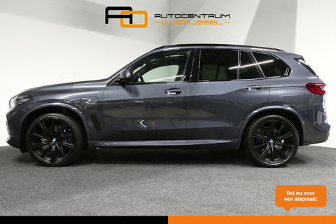 BMW X5 xDrive45e High Executive / M Sport / Panoramadak / Soft-close / Koplamp Laser / Elektr. verstelbare voorstoelen + memory / Luchtvering / Stoelverwarming voor + achter / Stoelventilatie / Head-Up Display / Apple Carplay - Andriod Auto / Ambiente verlichtin