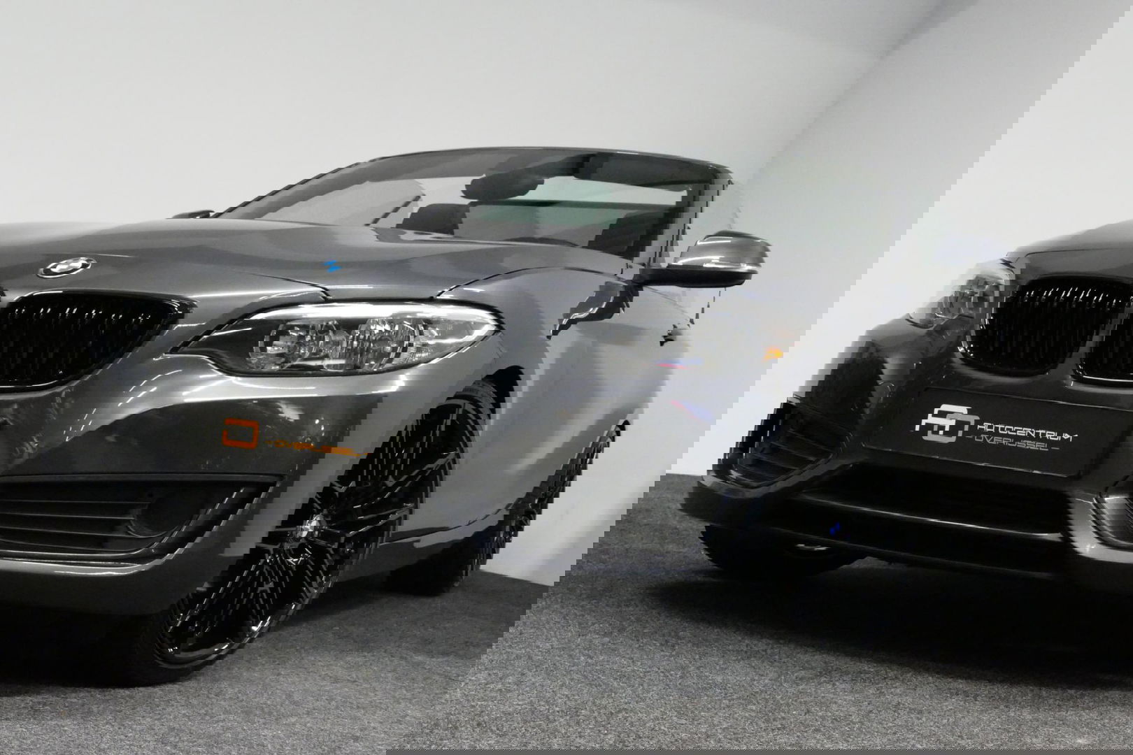 BMW 2 Serie Cabrio 218i Essential / Stoelverwarming / Windscherm / Climatronic / 19'' LMV / Parkeersensoren achter / BMW Radio Professional / Licht- & regensensor / Multimedia systeem