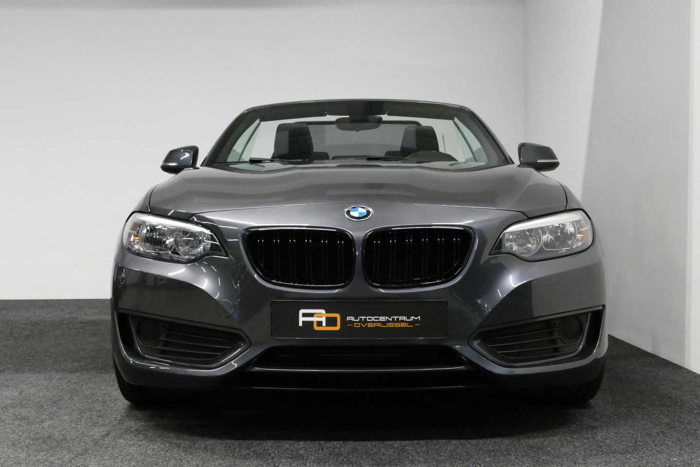 BMW 2 Serie Cabrio 218i Essential / Stoelverwarming / Windscherm / Climatronic / 19'' LMV / Parkeersensoren achter / BMW Radio Professional / Licht- & regensensor / Multimedia systeem