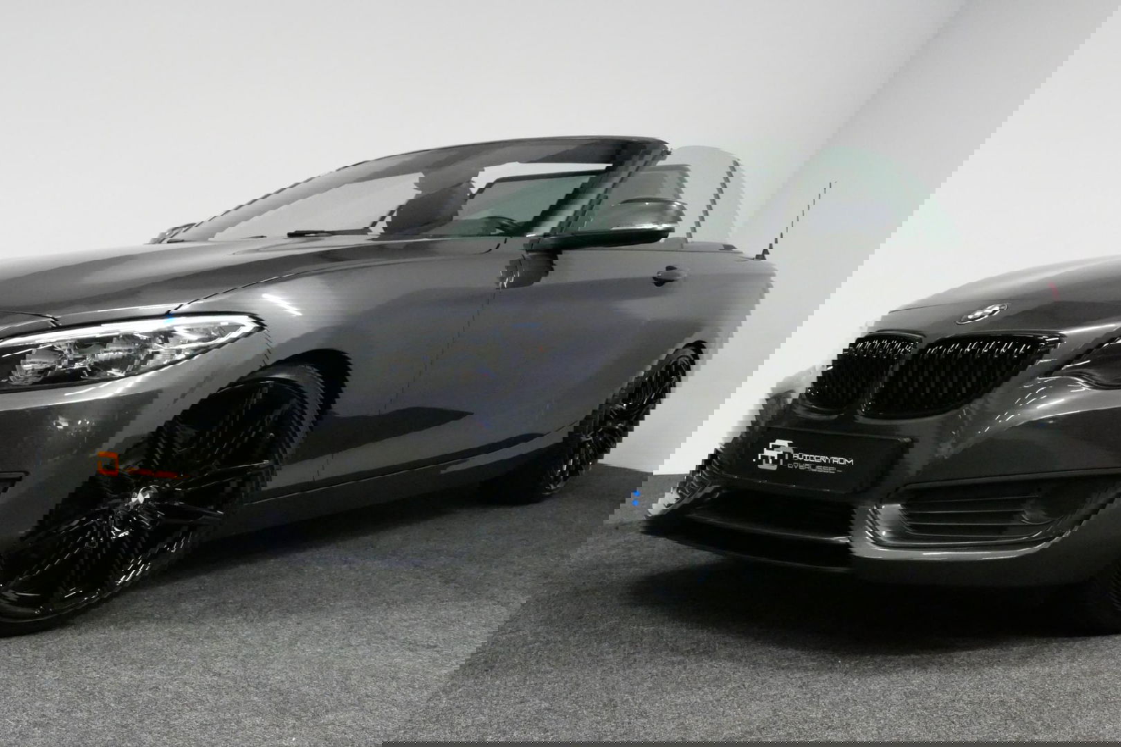 BMW 2 Serie Cabrio 218i Essential / Stoelverwarming / Windscherm / Climatronic / 19'' LMV / Parkeersensoren achter / BMW Radio Professional / Licht- & regensensor / Multimedia systeem