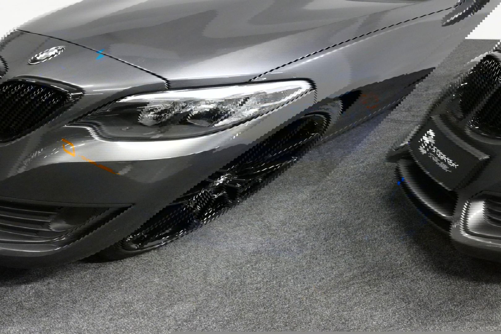 BMW 2 Serie Cabrio 218i Essential / Stoelverwarming / Windscherm / Climatronic / 19'' LMV / Parkeersensoren achter / BMW Radio Professional / Licht- & regensensor / Multimedia systeem