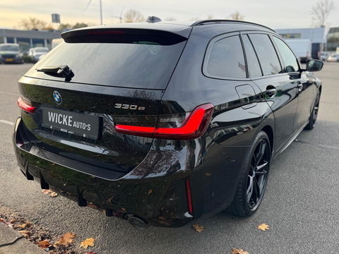 BMW 3 Serie Touring 330e xDrive High Executive Panorama Leder Camera