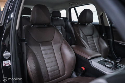 BMW 3 Serie Touring 330e High Executive 290 pk | Trekhaak | Leder | Sportstoelen | NL auto NAP | LED | CarPlay | Stoelverwarming |