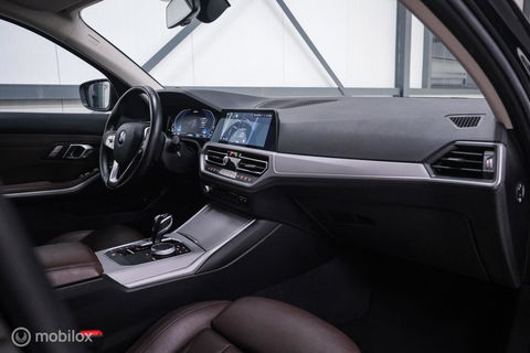 BMW 3 Serie Touring 330e High Executive 290 pk | Trekhaak | Leder | Sportstoelen | NL auto NAP | LED | CarPlay | Stoelverwarming |