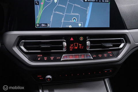 BMW 3 Serie Touring 330e High Executive 290 pk | Trekhaak | Leder | Sportstoelen | NL auto NAP | LED | CarPlay | Stoelverwarming |