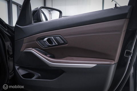 BMW 3 Serie Touring 330e High Executive 290 pk | Trekhaak | Leder | Sportstoelen | NL auto NAP | LED | CarPlay | Stoelverwarming |