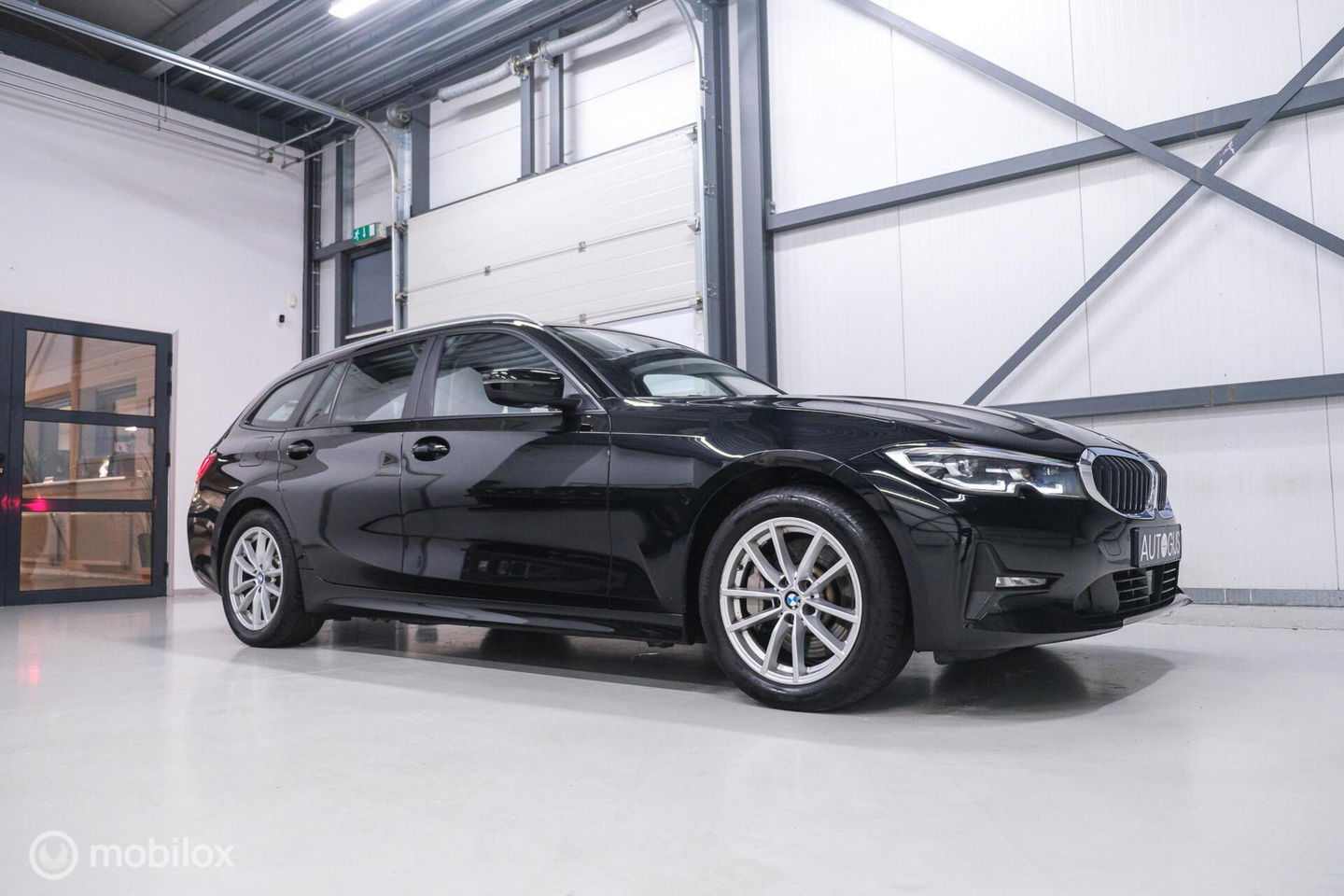BMW 3 Serie Touring 330e High Executive 290 pk | Trekhaak | Leder | Sportstoelen | NL auto NAP | LED | CarPlay | Stoelverwarming |