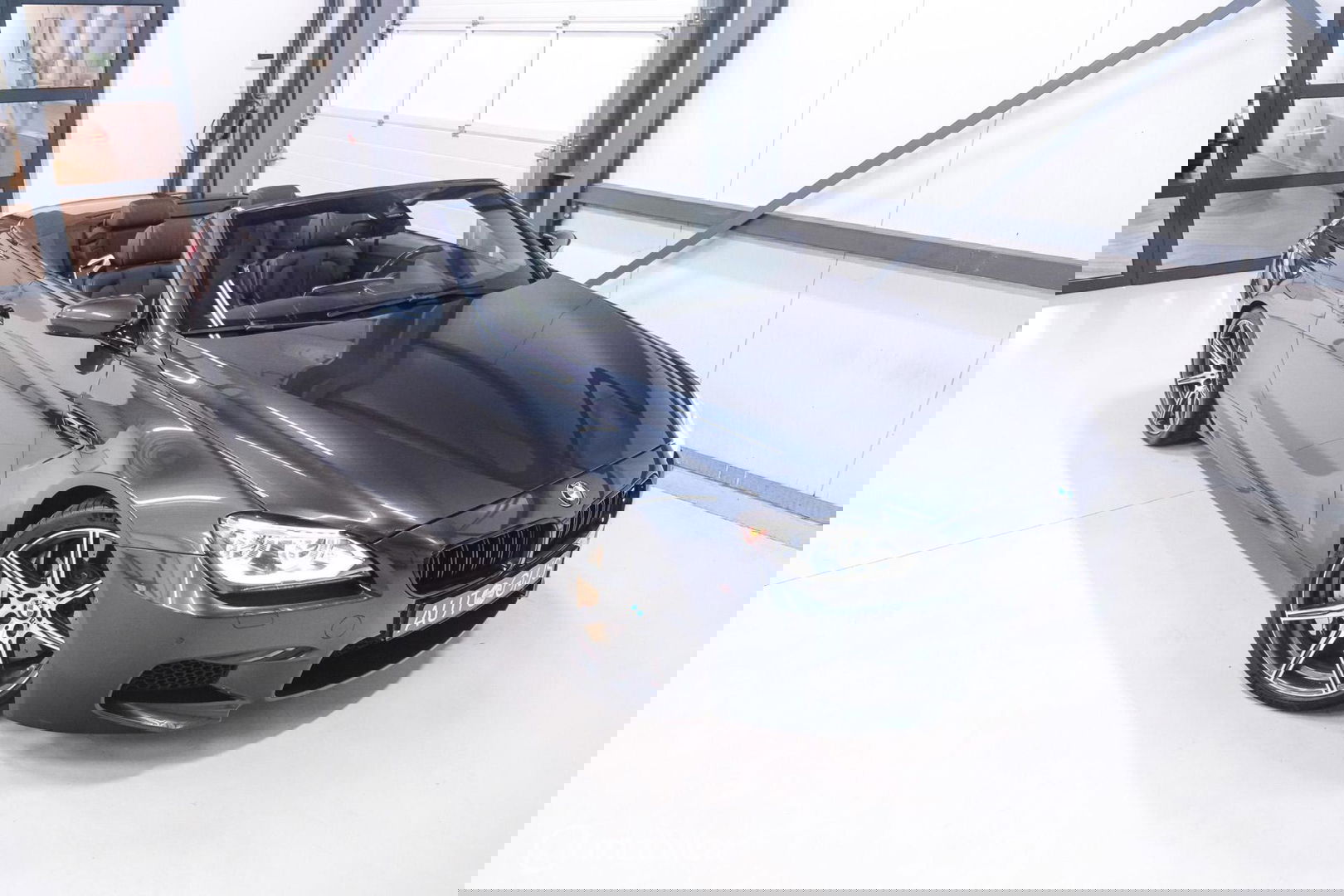 BMW 6 Serie Cabrio M6 Competition Package 575 pk | Keramisch | B&O | M Drivers Pack | NL auto NAP | Singapur Grau | Softclose | HUD | 360 ca