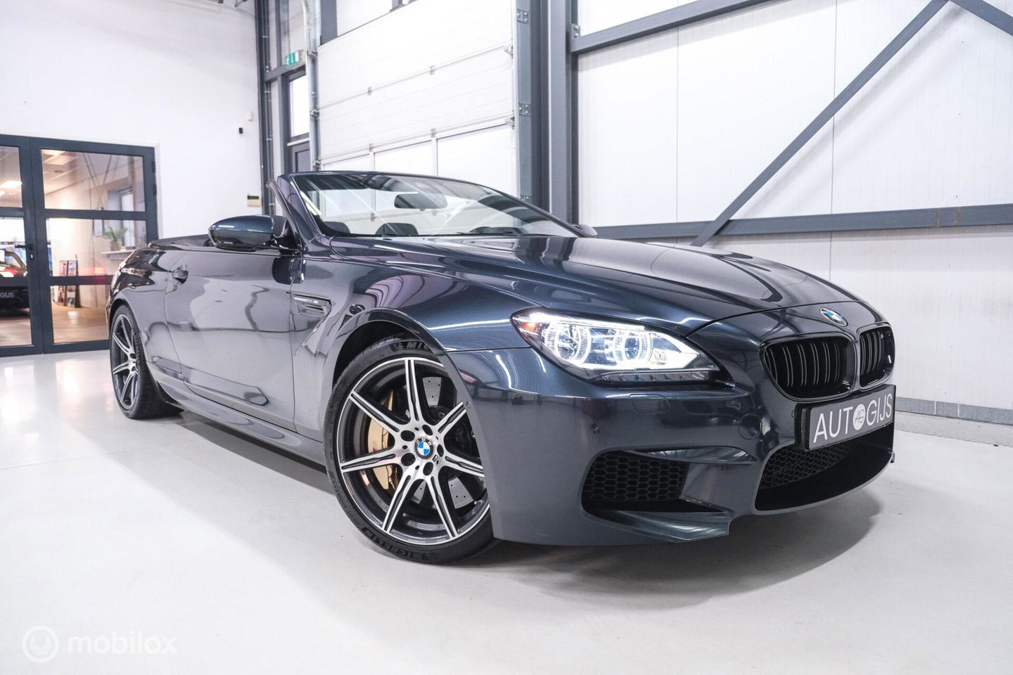 BMW 6 Serie Cabrio M6 Competition Package 575 pk | Keramisch | B&O | M Drivers Pack | NL auto NAP | Singapur Grau | Softclose | HUD | 360 ca