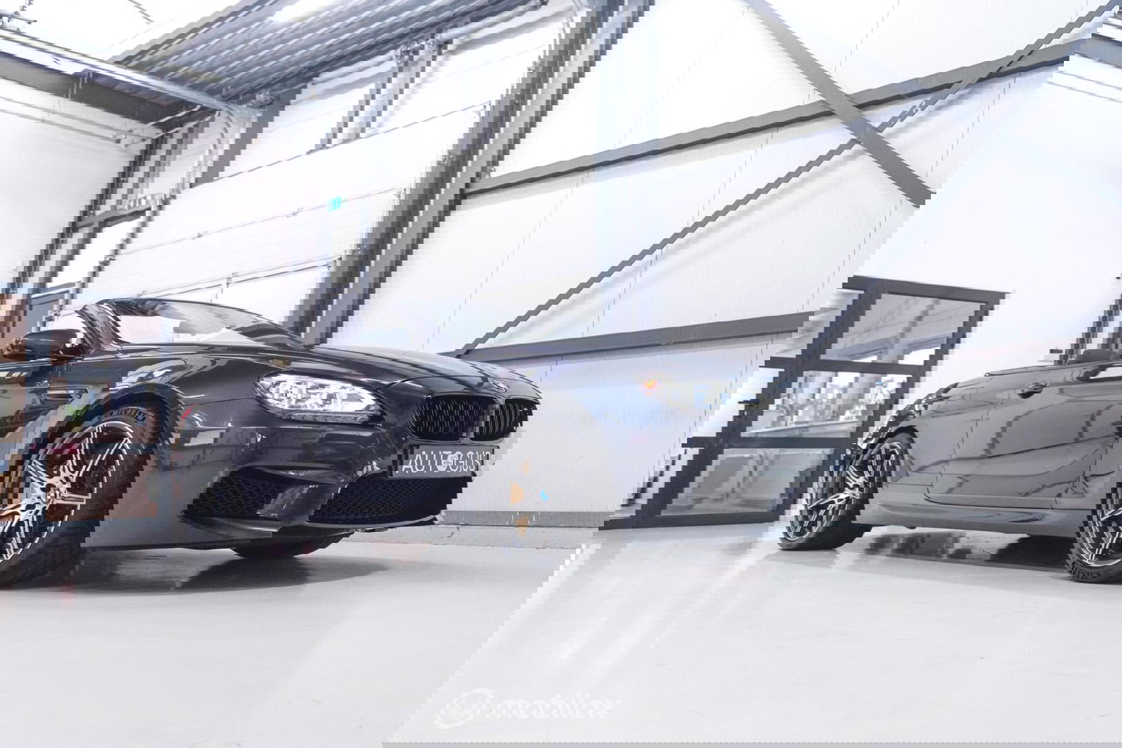 BMW 6 Serie Cabrio M6 Competition Package 575 pk | Keramisch | B&O | M Drivers Pack | NL auto NAP | Singapur Grau | Softclose | HUD | 360 ca