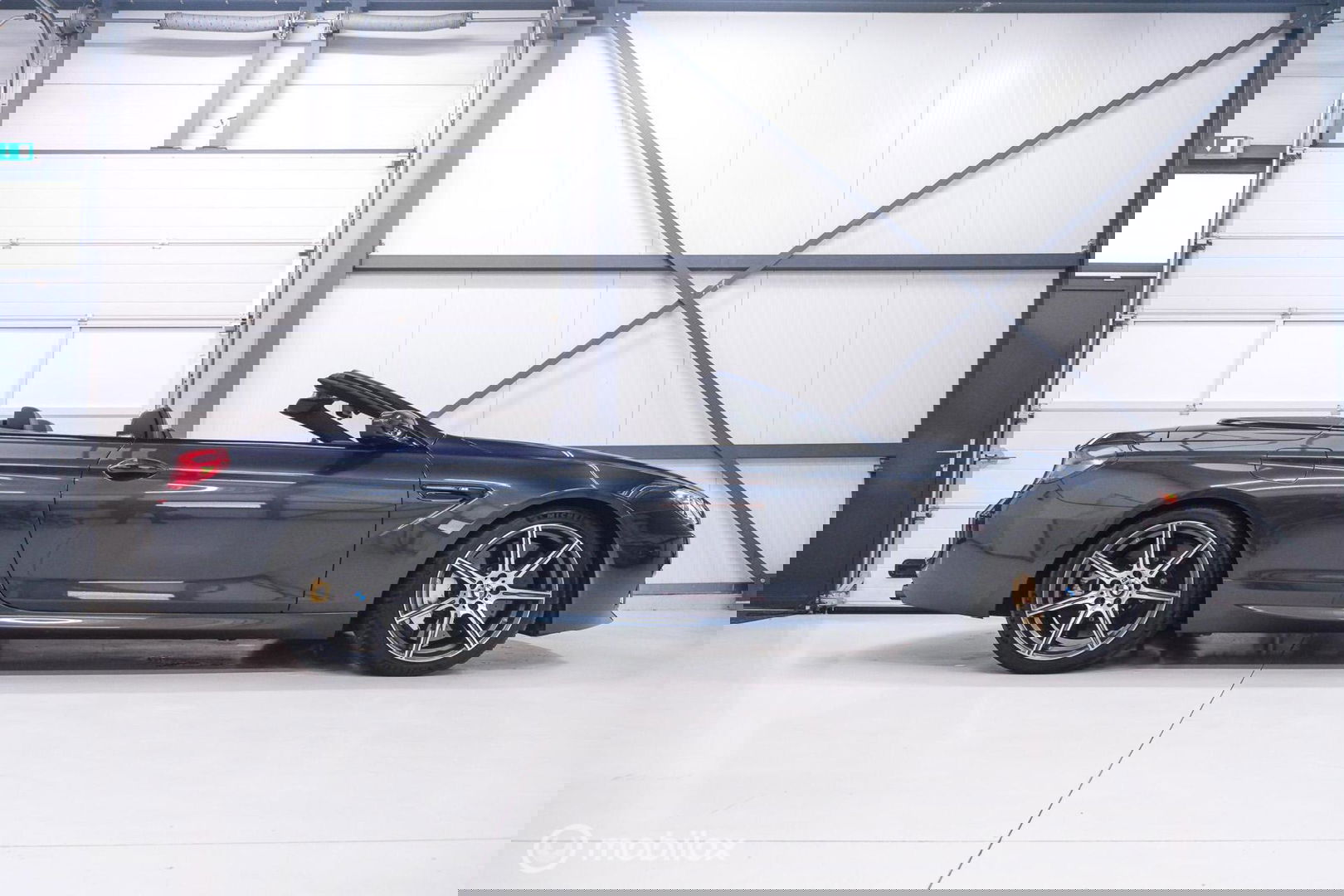 BMW 6 Serie Cabrio M6 Competition Package 575 pk | Keramisch | B&O | M Drivers Pack | NL auto NAP | Singapur Grau | Softclose | HUD | 360 ca