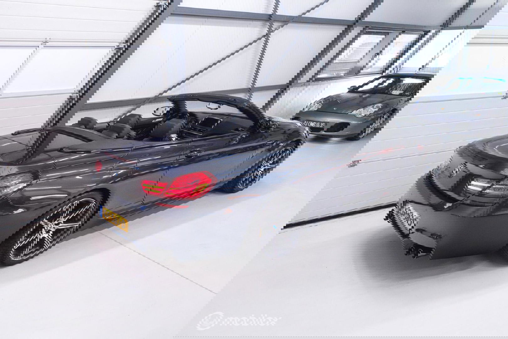 BMW 6 Serie Cabrio M6 Competition Package 575 pk | Keramisch | B&O | M Drivers Pack | NL auto NAP | Singapur Grau | Softclose | HUD | 360 ca