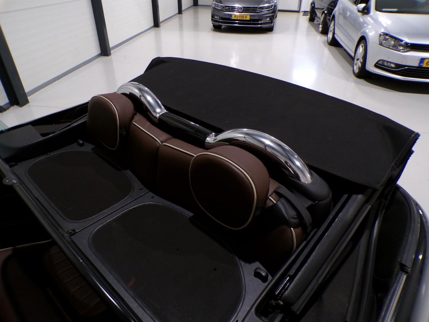 MINI Cabrio 1.6 Cooper S 174PK "Origineel NL!" Cognac-Leer Stoelverwarming Bluetooth Navigatie Cruise 17"Velgen Parkeersensor