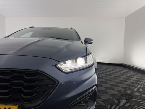 Ford Mondeo Wagon 2.0 IVCT HEV ST-Line (INCL-BTW) Aut. *LEATHER-MICROFIBRE | ADAPTIVE-CRUISE | FULL-LED | SONY-AUDIO | MEMORY-PACK | BLIND-SPOT | HEATED-COMFORTSEATS | CAMERA | KEYLESS | DAB+ | NAVI-FULLMAP | CARPLAY | TOWBAR | ..