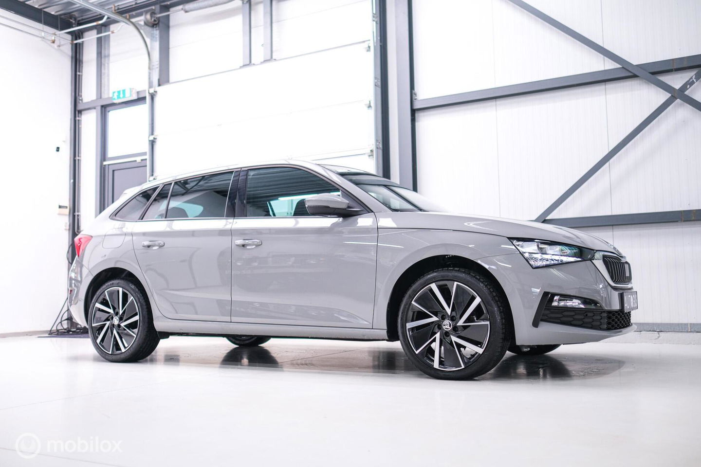 Škoda Scala 1.0 TSI Sport Business | Sportstoelen | Trekaak | NAP NL auto | LED | Adaptive cruise | Clima | Dealer oh | 17 inch | CarPlay |