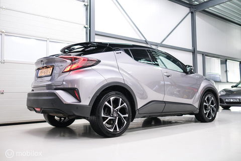 Toyota C-HR 1.8 Hybrid Bi-Tone Plus | Camera | Stoel + stuurwiel verwarming | Dealer OH | LED | DAB |