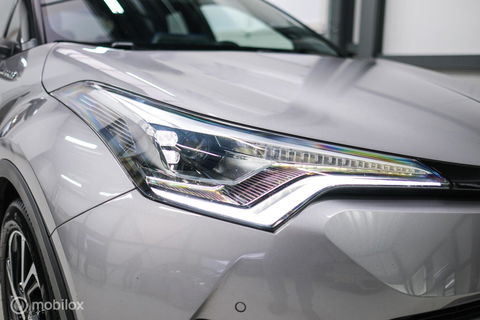 Toyota C-HR 1.8 Hybrid Bi-Tone Plus | Camera | Stoel + stuurwiel verwarming | Dealer OH | LED | DAB |
