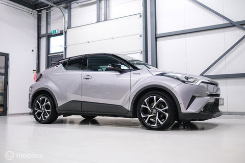 Toyota C-HR 1.8 Hybrid Bi-Tone Plus | Camera | Stoel + stuurwiel verwarming | Dealer OH | LED | DAB |