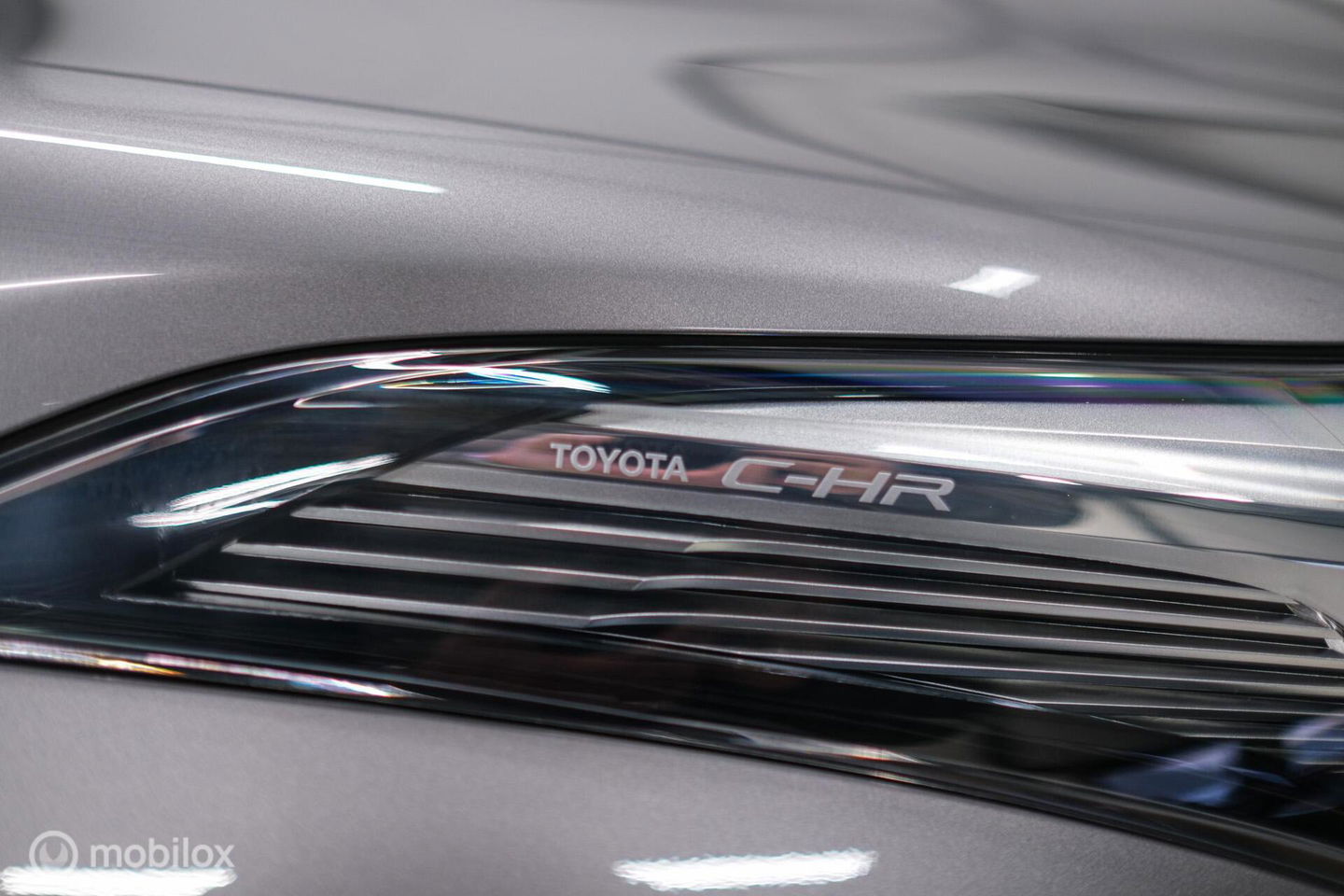 Toyota C-HR 1.8 Hybrid Bi-Tone Plus | Camera | Stoel + stuurwiel verwarming | Dealer OH | LED | DAB |
