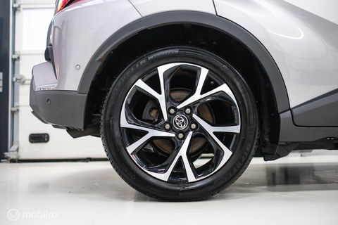 Toyota C-HR 1.8 Hybrid Bi-Tone Plus | Camera | Stoel + stuurwiel verwarming | Dealer OH | LED | DAB |