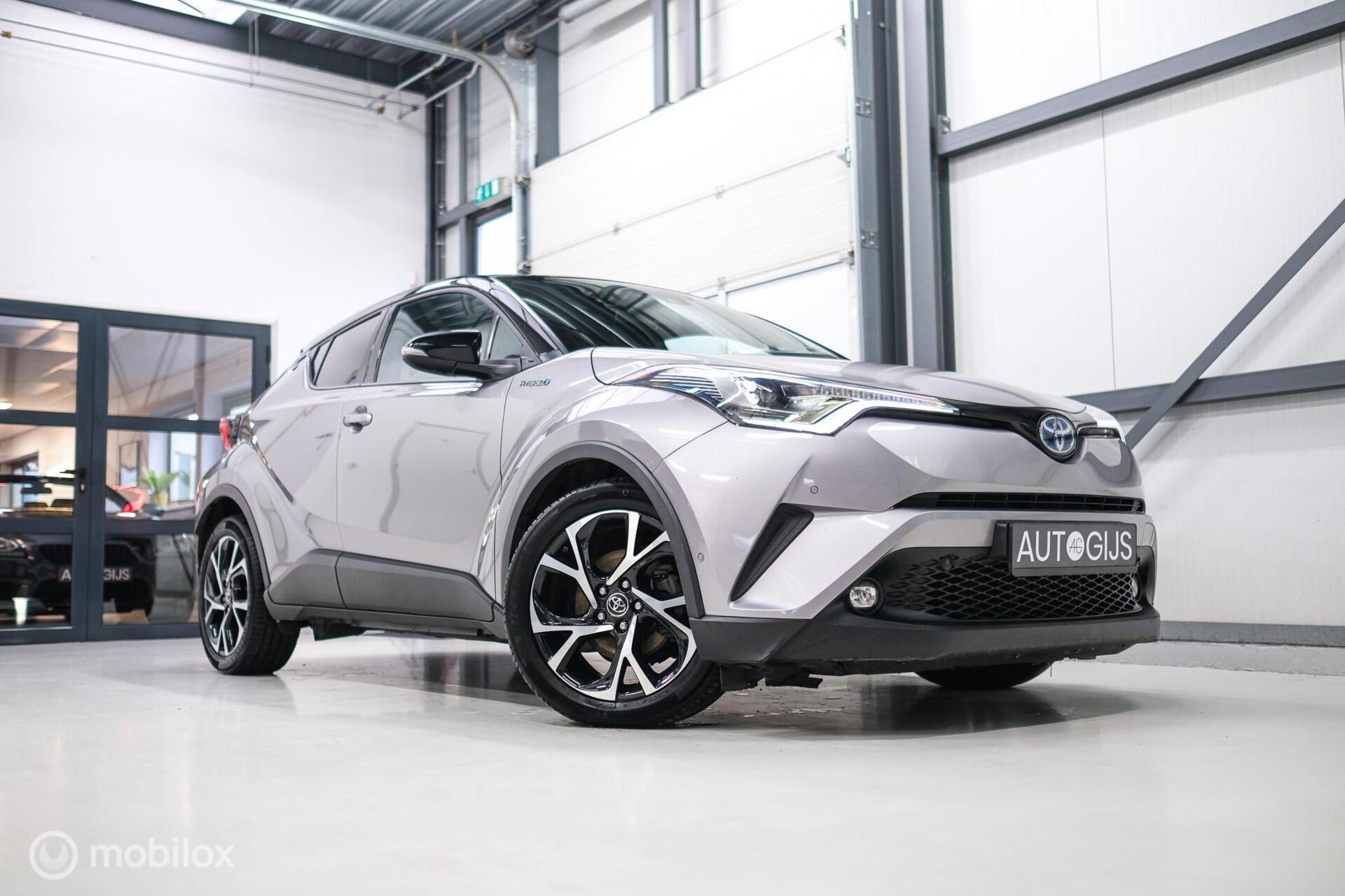 Toyota C-HR 1.8 Hybrid Bi-Tone Plus | Camera | Stoel + stuurwiel verwarming | Dealer OH | LED | DAB |