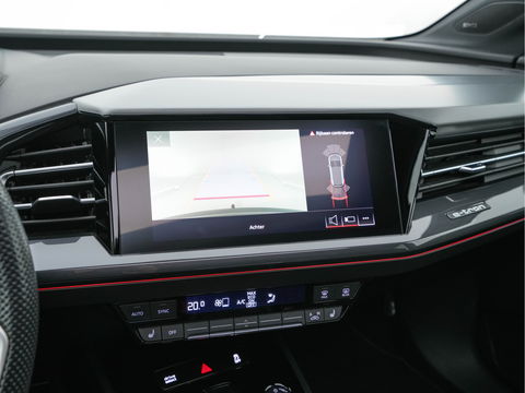 Audi Q4 e-tron 40 Launch edition S Competition 77 kWh [ 3-Fase ] {SOH-90%} (INCL.BTW) *HEAT-PUMP | PANO | HEAD-UP | LEATHER-FABRIC | MATRIX-LED | SONOS-SOUND | ADAPTIVE-CRUISE | HEATED-SPORTSEATS | AMBIENT-LIGHT | DIGI-COCKPIT | CAMERA | KEYLESS | DAB+ | NAVI-FULLMA